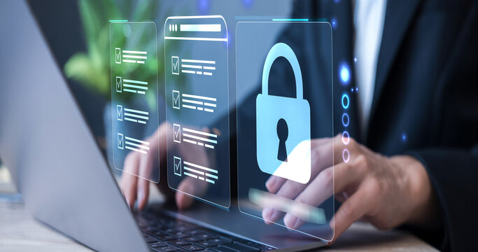 Professional Using Laptop with Advanced Cyber Security Data Protection Interface