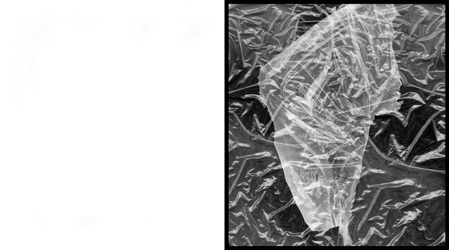 Crumpled plastic wrap texture on black background, wrinkled transparent cellophane film, macro detail of creased synthetic material for overlay effects