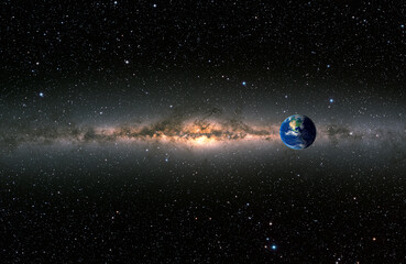 Planet Earth in front of the Milky Way galaxy "Elements of this image furnished by NASA " © muratart