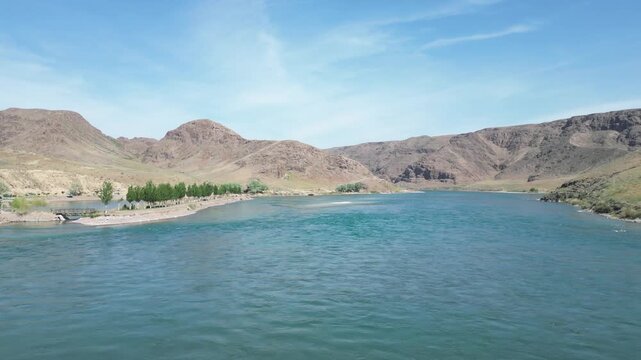 Wide aerial view of the Ili River and mountains in Kazakhstan