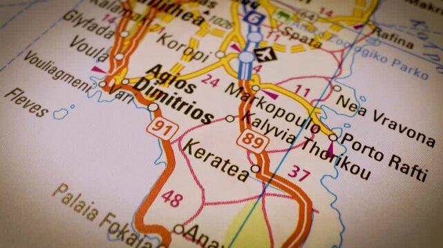 road atlas journey to athens, greece, close up gliding shot