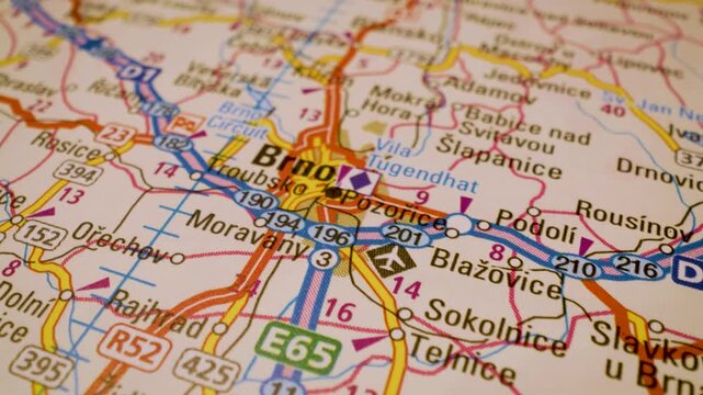 cinematic macro flight to brno, czech republic, across detailed road atlas map