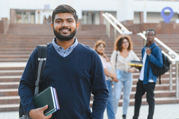Indian student smiling on university campus