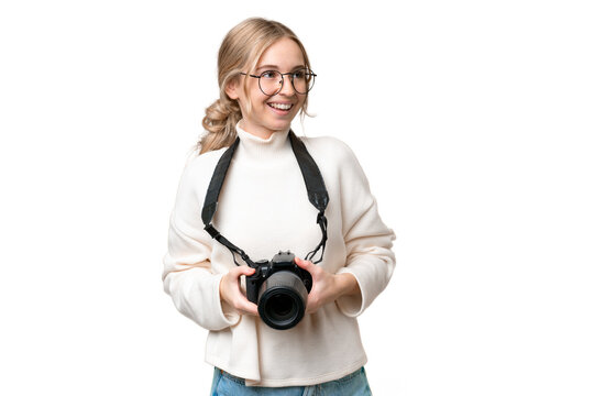 Young photographer English woman over isolated background happy and smiling