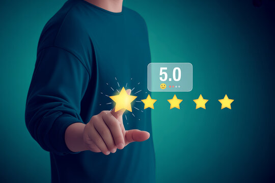 Hand touching holographic five star feedback on screen for best service rating.
