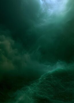 Close-up of a stormy sky. the sky is filled with dark, ominous clouds that are covering the entire frame of the image.