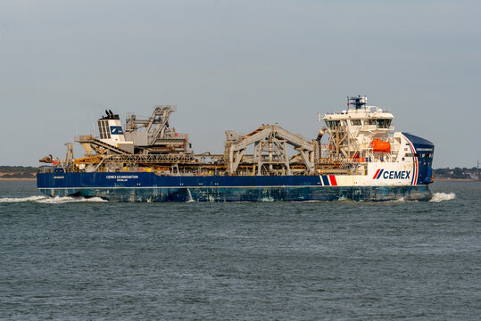 Southampton Water England UK. 01.08.2026. large, specialised ship with extensive conveyor systems for aggregate dredging and cranes i