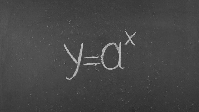 Exponential growth concept - mathematical formula on a blackboard