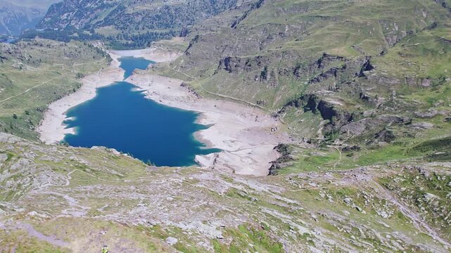 Above mountain peak with Twin lakes on background (Orobie mountains, Lombardy landscape in the summer)