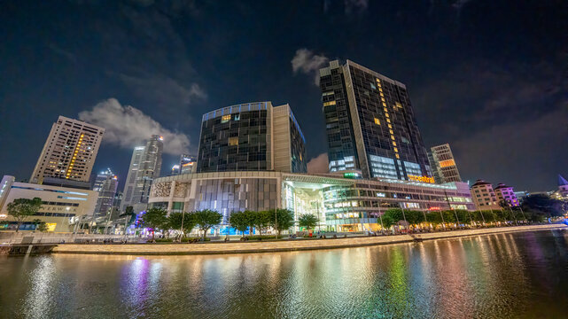 Singapore - September 13, 2023: River walk and buildings at night