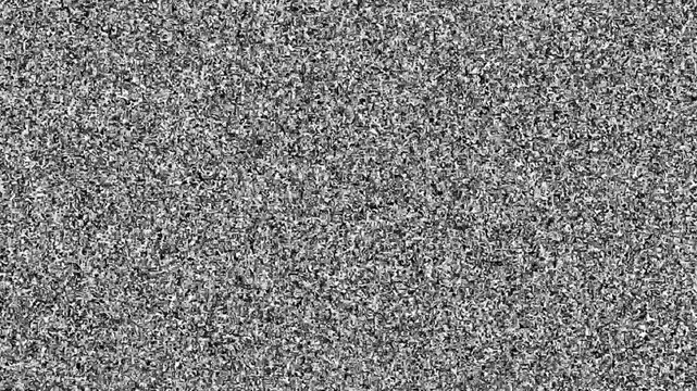 Old Retro TV - Static tv black and white noise caused by bad signal reception. Loop animation. 4K