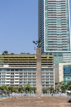 Selamat Datang Monument stands at the center of the Hotel Indonesia Roundabout in Jakarta