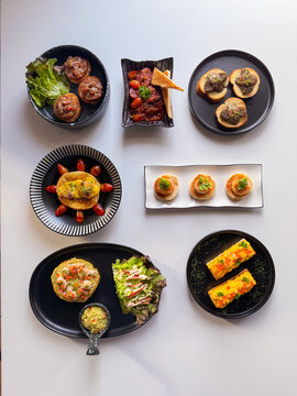 homemade Thai style tapas in a white background
