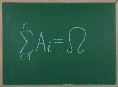 Concept of a complete system of events in statistics on a green board