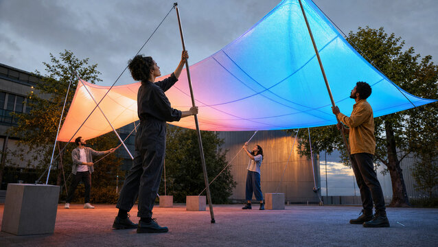 Community Team Rebalances a Luminous Canopy