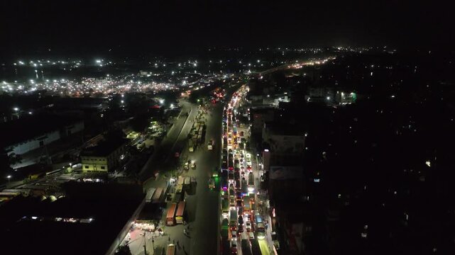 Aerial view of a congested city highway at night