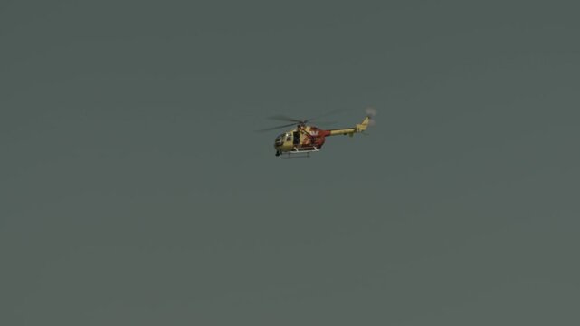 Westpac Lifesaver Rescue Helicopter Flying in Clear Sky Over