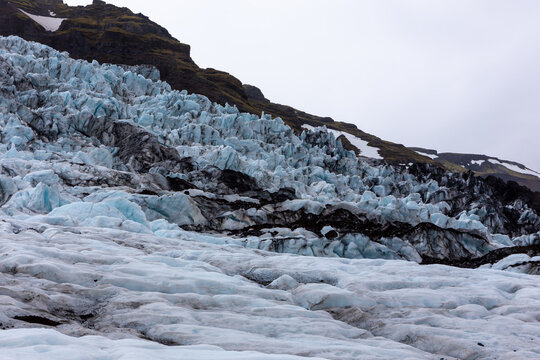 Skaftafell Glacier icefall and volcanic mountain landscape in Iceland