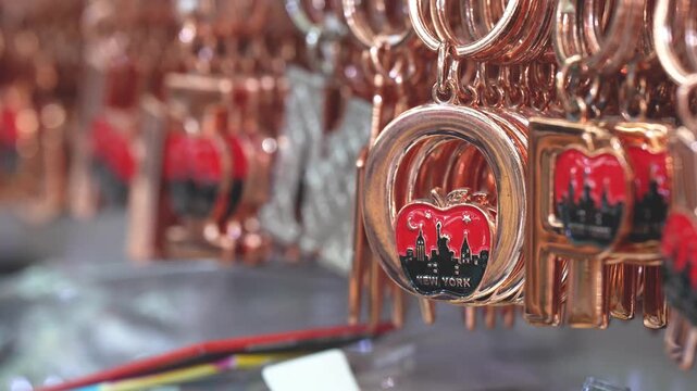 Collection of New York keychain souvenirs showcasing iconic symbols and city landmarks