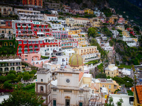 Stunning aerial drone panorama of Positano on the Amalfi Coast, Italy, colorful hillside houses, dramatic cliffs and the Mediterranean Sea