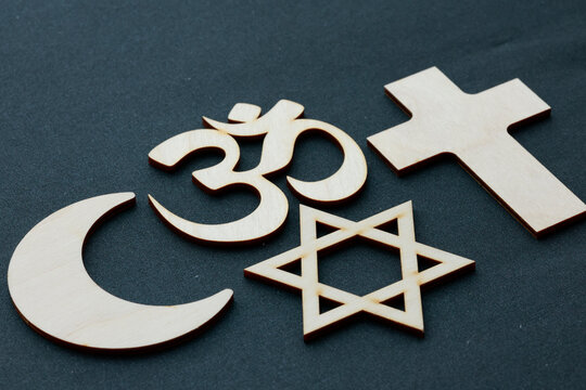 Symbols from various religions, including Christianity, Judaism, Islam, and Hinduism, illustrating the interfaith concept of peace and unity.