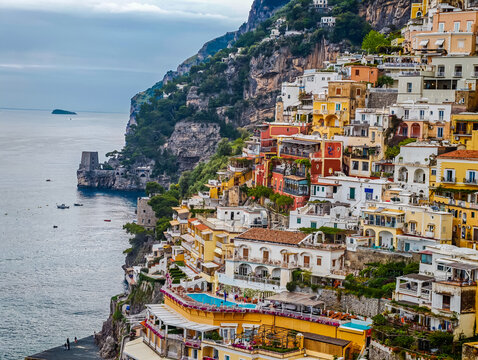 Stunning aerial drone panorama of Positano on the Amalfi Coast, Italy, colorful hillside houses, dramatic cliffs and the Mediterranean Sea