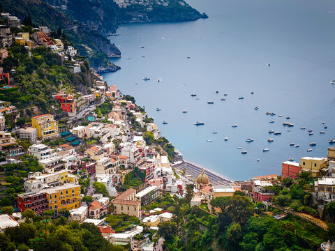Stunning aerial drone panorama of Positano on the Amalfi Coast, Italy, colorful hillside houses, dramatic cliffs and the Mediterranean Sea