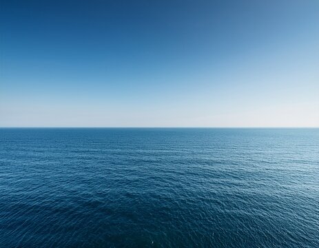 serene minimalistic photograph of vast tranquil ocean horizon under soft clear sky emphasizing significance of world