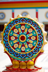 Naklejka premium Ornate Dharma Wheel at Viharn Sien Temple