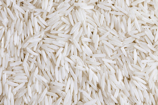 Close up texture of white long grain basmati rice grains