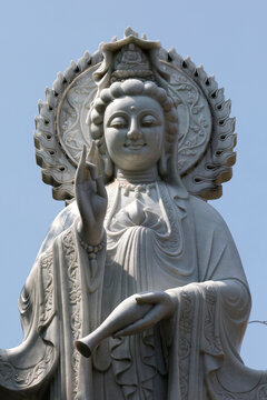 Xa Loi Pagoda. White marble statue of Quan Am, the goddess of compassion and mercy. Ho Chi Minh City. Vietnam.