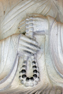 Bai Dinh Pagoda. Gallery of the 500 Arhats. The white marble monks are enlightened disciples of the Buddha. A close-up of the marble, weathered by time and pilgrims. Ninh Binh, Vietnam.