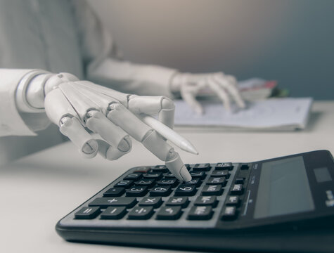 Close-up Robot Hand Pressing Calculator Buttons for AI Accounting Concept