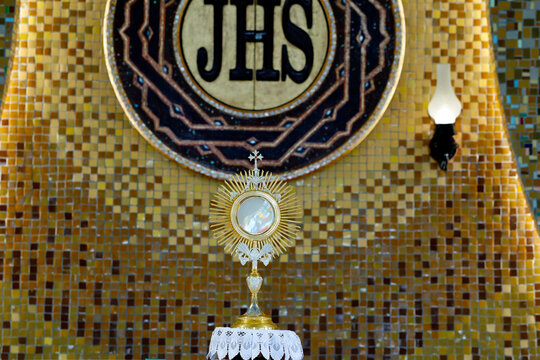Gilded Monstrance and IHS Symbol at Altar