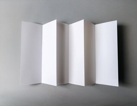 blank white tri fold brochure and a single folded card mockup on a light gray background