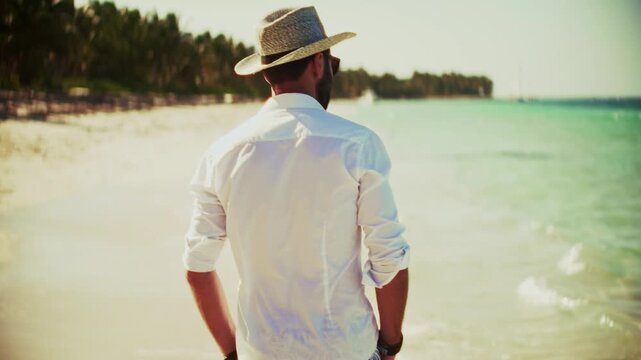 Tourist Walking Along Sandy Ocean Beach Tropical. Coast Vacation. Travel And Relaxation. Summer Recreation 