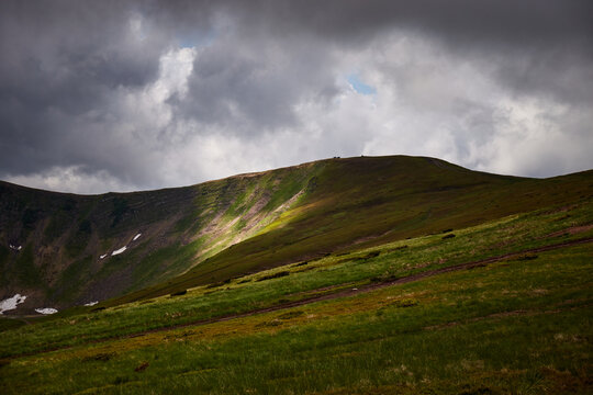 Sunlight and Shadow Patterns on Green Mountain Slopes in Early Summer, Svydovets Ridge, Ukrainian Carpathians