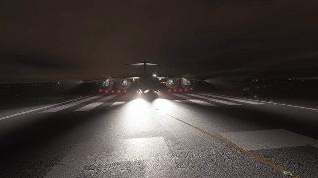 Military Transport Aircraft on Runway at Night with Bright Lights