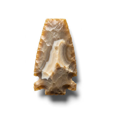 Ancient banded flint arrowhead artifact isolated on white background