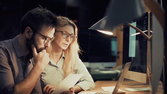 Colleagues Discussing Project Strategy. Late Night Programmer Team. Corporate Business Collaboration. Overtime 