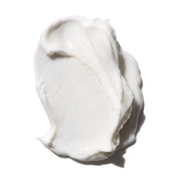 Cream smear on a transparent background. Cream swatch, cream spread, cream swipe, cream stroke, cream streak, cream dollop.