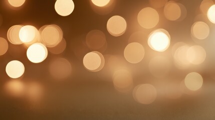 Fototapeta premium Warm tan Christmas background with soft golden bokeh lights for festive design