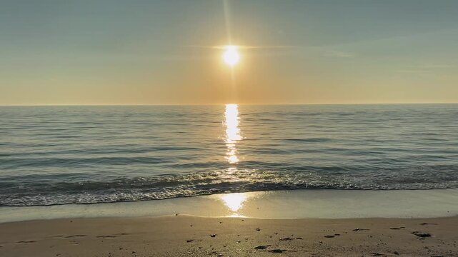 Calm, relaxing beach sunset over the Gulf of Mexico at Casey Key in Sarasota, Florida. 