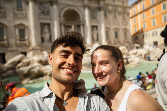 Selfie with the Trevi Fountain on a sunny day