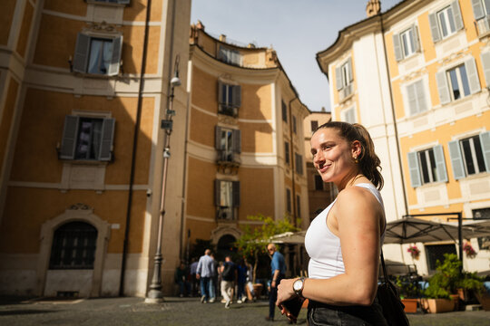 Smiling woman at Piazza Ignazio in Rome