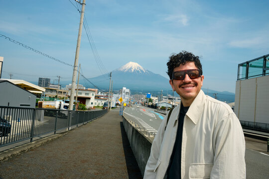 Man on Walkway with Mount Fuji Behind in Shizuoka