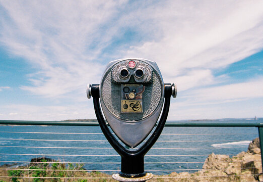 Coin-operated binoculars overlooking the scenic coast of Maine