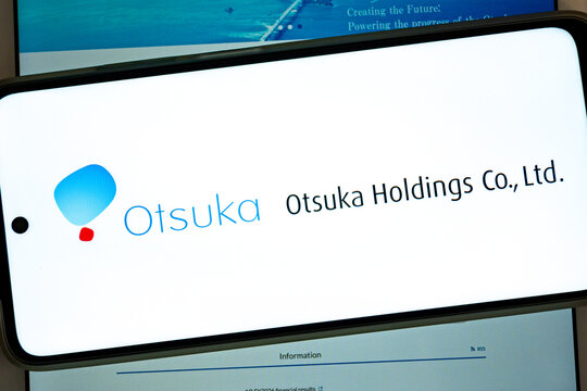 Otsuka holdings co., ltd. Logo on an illuminated device