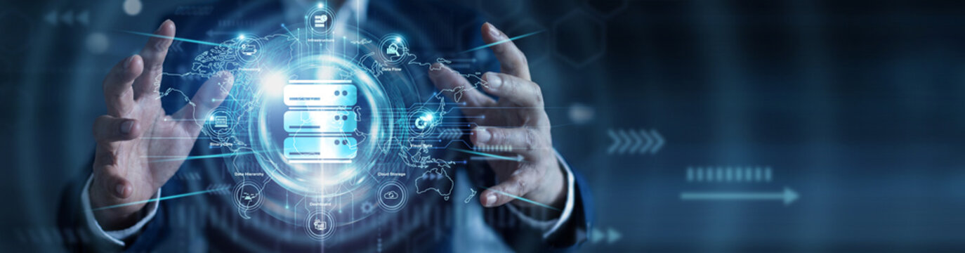 Information analytics. Data engineer holding glowing big data visualizer over a global network on an abstract dark background. Predictive analysis and cloud trends.