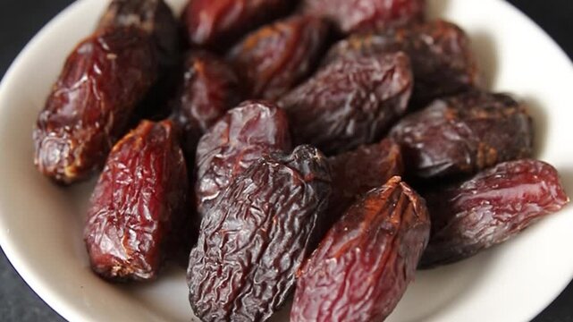 Dates sweet dessert edible fruits of the date palm food preparation tasty snack fresh and delicious gourmet food background on the table rustic food top view copy space keto and paleo diets vegetarian